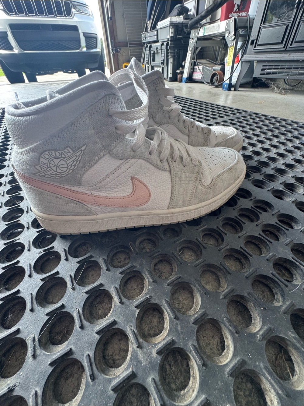 Jordan Women's High-Top Sneakers in Light Gray with Pink Swoosh